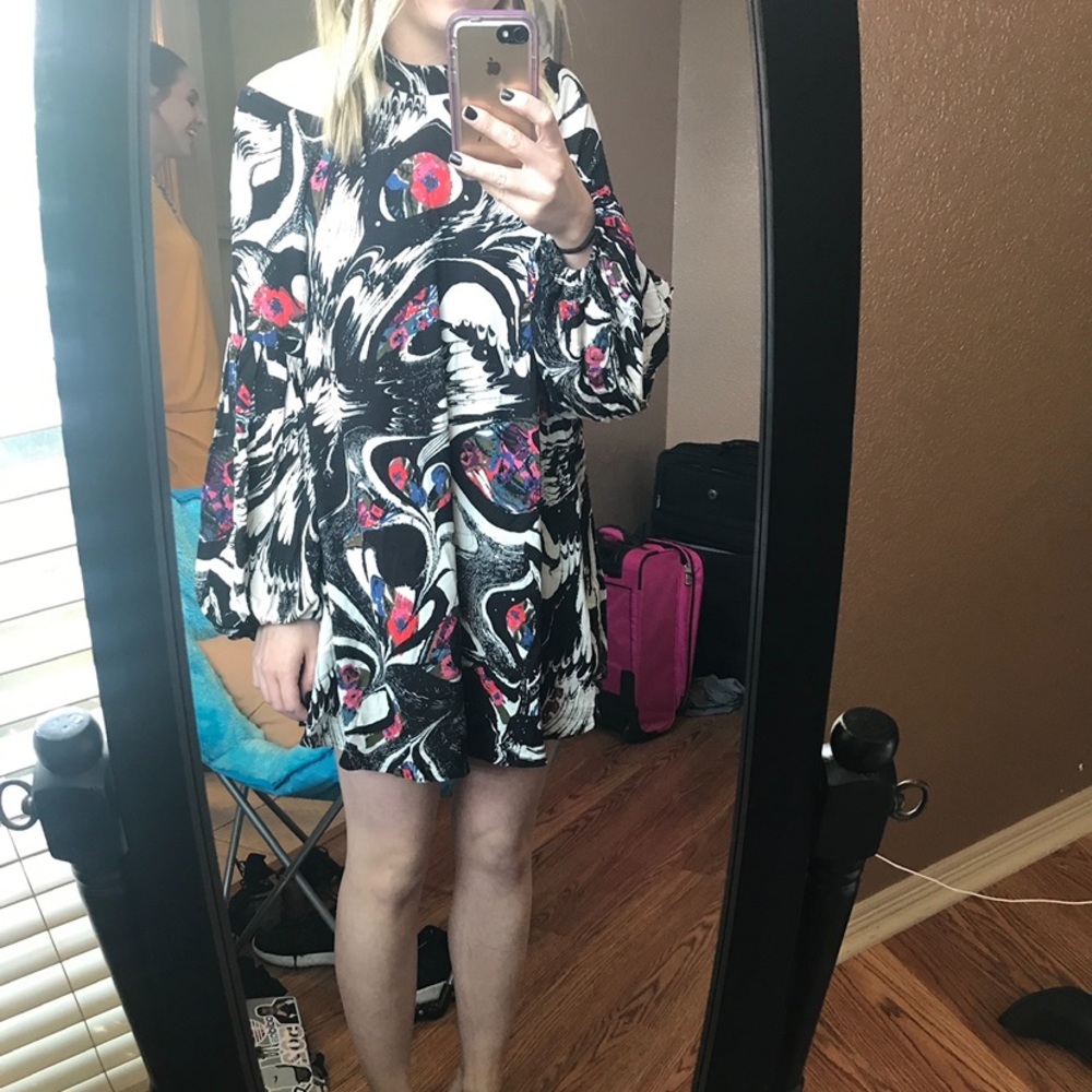 FREE PEOPLE long sleeve flowing black and white pattern high neck dress.